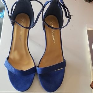 Gently worn royal blue heeled ankle wrap sandals